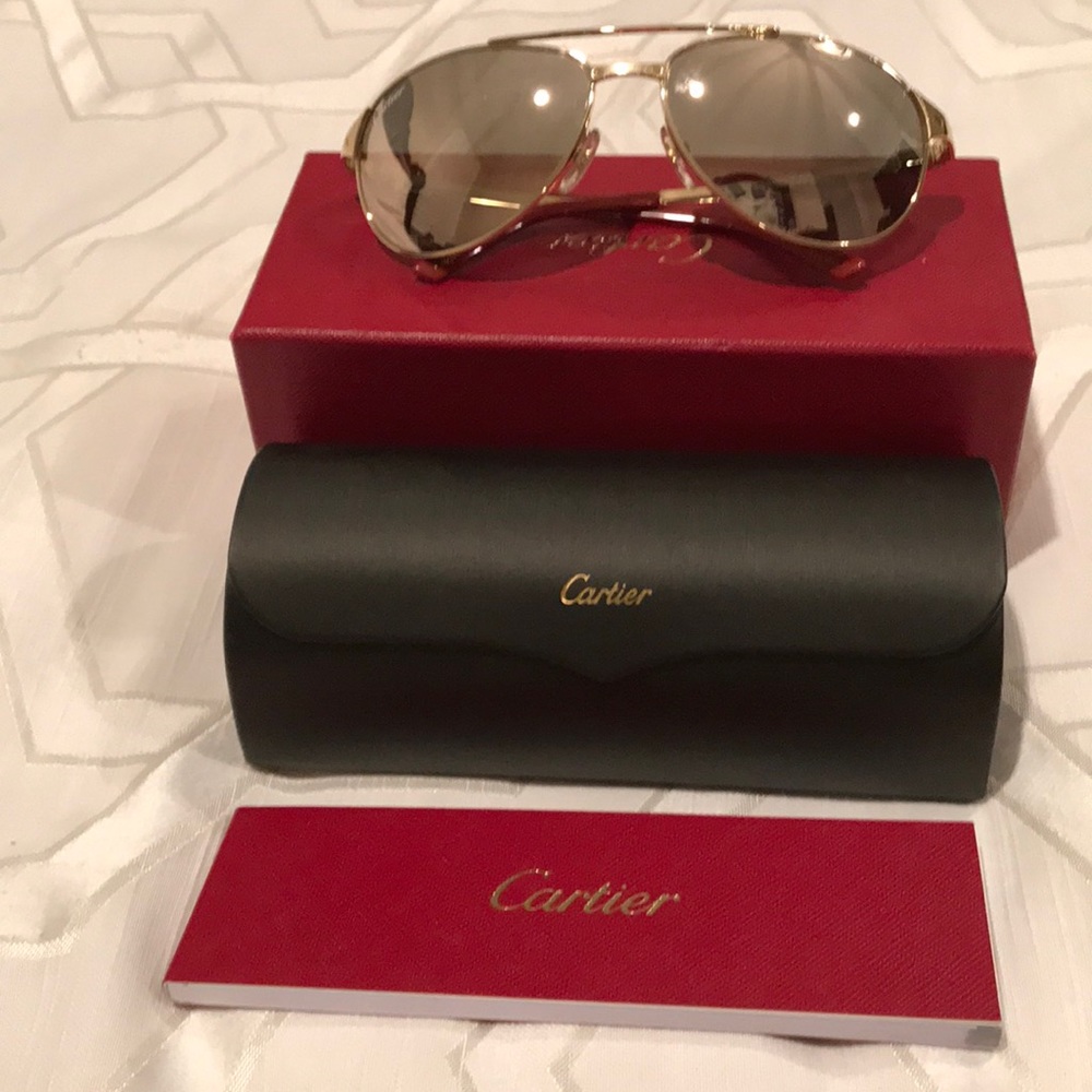 Cartier Gold Tone Bushes metal.